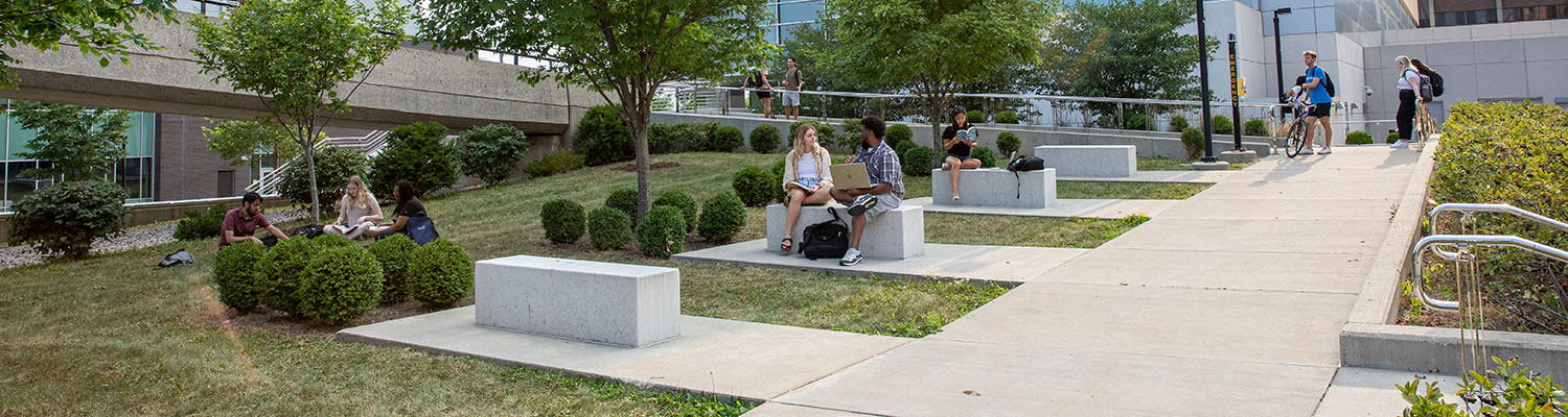 Students socializing outside of the KIRC building
