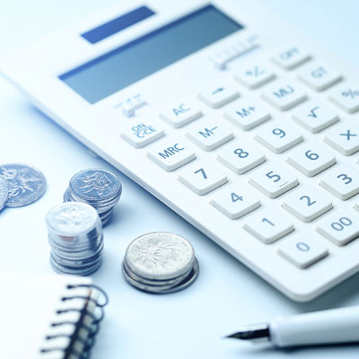 calculator and money on desk