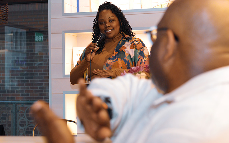 Emerald Mills speaks to a crowd.