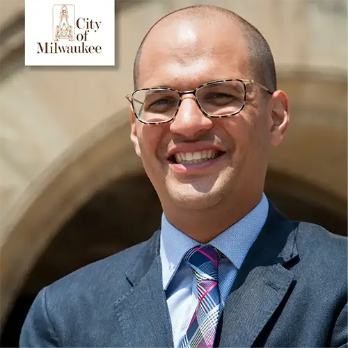 Sam headshot with City of Milwaukee logo