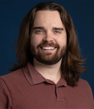 Headshot of Chris Skinner smiling.