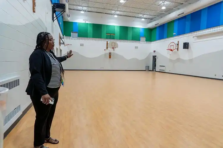 Principal Dr. Tonya Love shows off remodeled gym