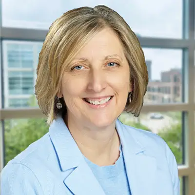 Headshot of Carolyn Esswein in the SARUP building.