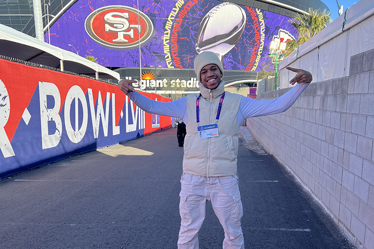 UWM junior Davien Holton poses outside Allegiant Stadium in Las Vegas, where he performed during the Super Bowl halftime show. (Photo courtesy of Davien Holton)