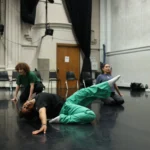 Students rehearse in a studio.