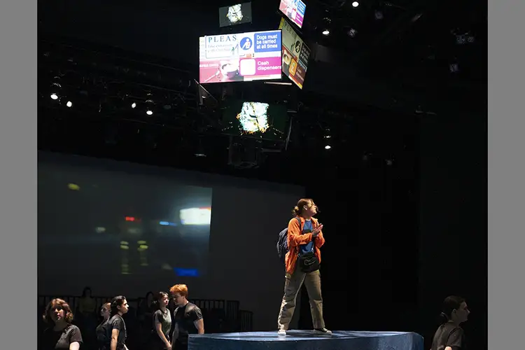 Digital screens and staging elements designed by Chris Guse during a live theatrical performance.