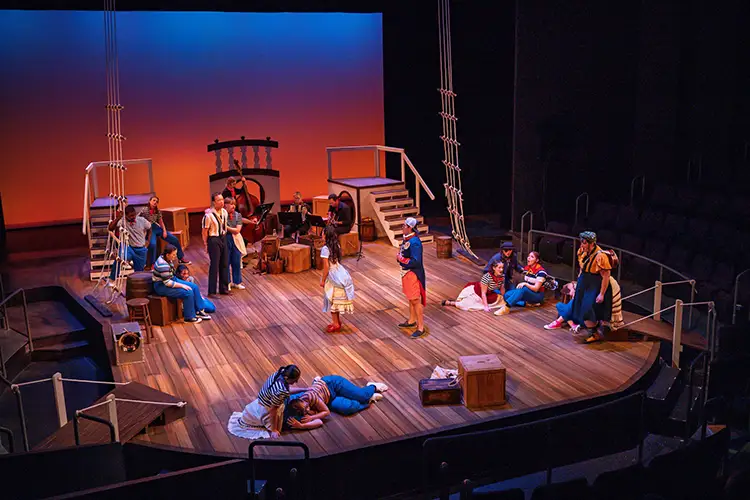 Staged ship‑deck scene showcasing Chris Guse’s theatrical design and production work.
