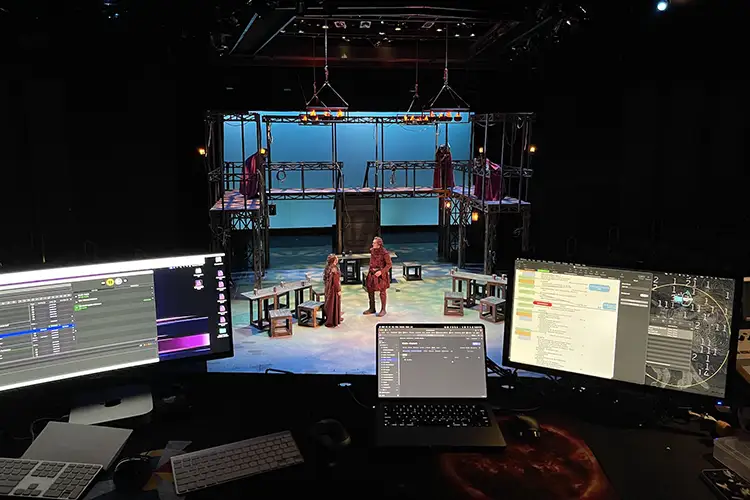 Tech booth view of stage setup during a theatrical production Chris Guse designed.
