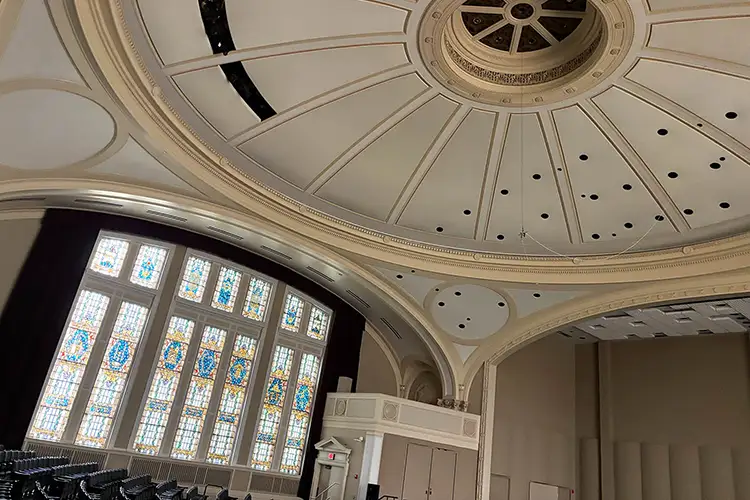 Stained glass windows in a large concert hall