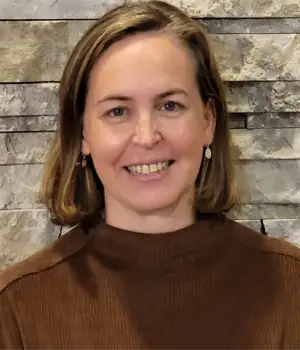 Headshot of Alicia Levin smiling.
