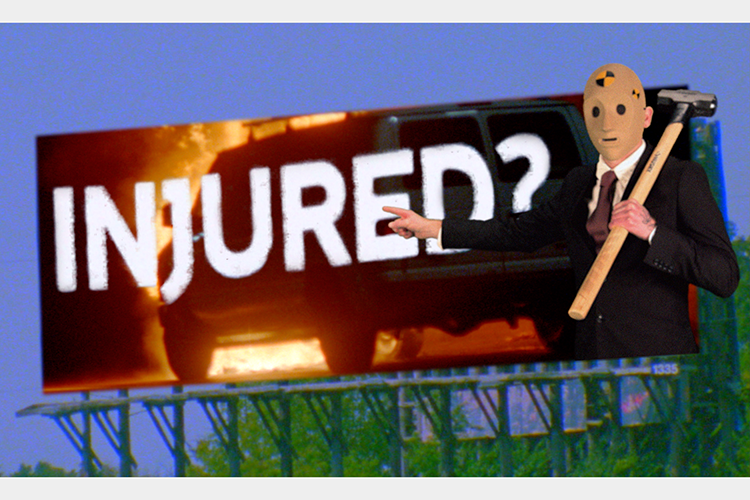 a crash-test dummy holding a sledge hammer pointing at a billboard reading "Injured?" a crash-test dummy holding a sledge hammer pointing at a billboard reading "Injured?"