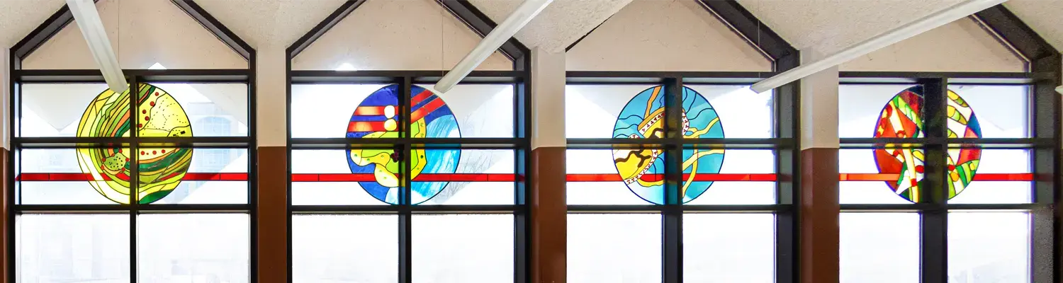 four stained glass window in Lapham Hall