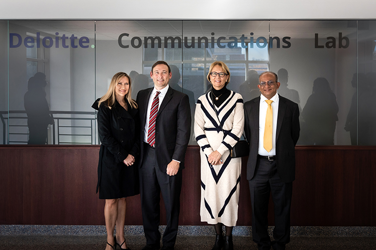 Donors in from of Deloitte Communications Lab