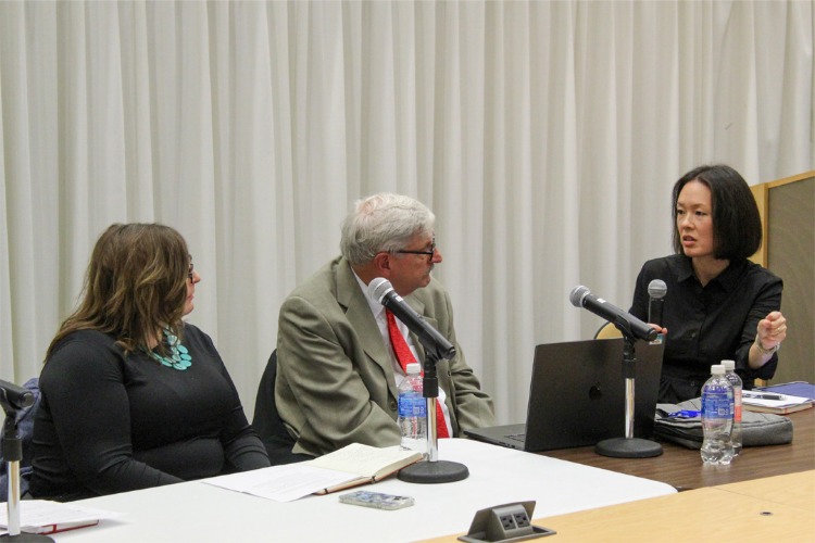 Two panelists look at panel moderator Jennifer Johung during C21's State of the Humanities MKE panel (October 30, 2025).