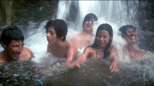 family in waterfall