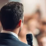 person speaking to audience