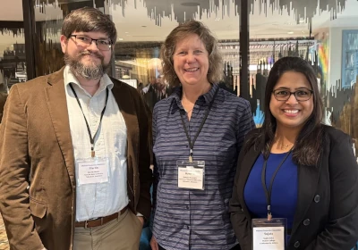 Alums Martin Meder and Sujata Saha with Professor Neumann