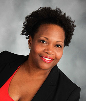 Raquel Farmer-Hinton (black woman), Associate Professor in Educational Policy and Community Studies