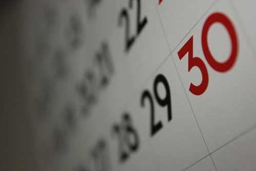 Off center image of a calendar displaying certain days of the month
