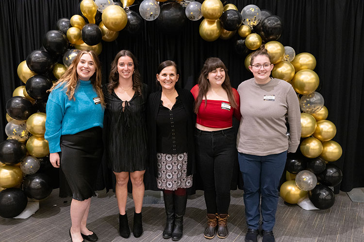 Leanne Evans, associate professor of teaching and learning (third from left) with Silvey Anderson, Cassidy Feyen, Alissa Breen, and Anna Callahan.