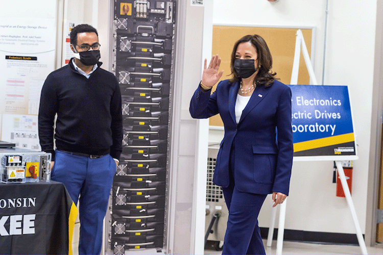Vice President Kamala Harris enters lab, waving