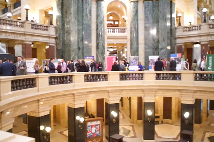 Undergraduate Tien Wong presents research on using AI in materials science to state leaders