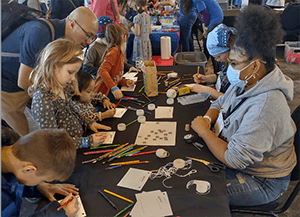 UWM engineering students pitch in to inspire girls to pursue STEM
