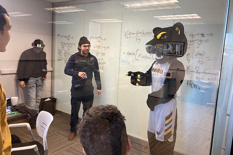 two men and a mascot two men and a mascot