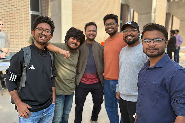 A group of six young Arab American students smile for the camera. A group of six young Arab American students smile for the camera.