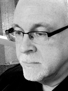 Headshot of Stuart Moulthrop in black & white