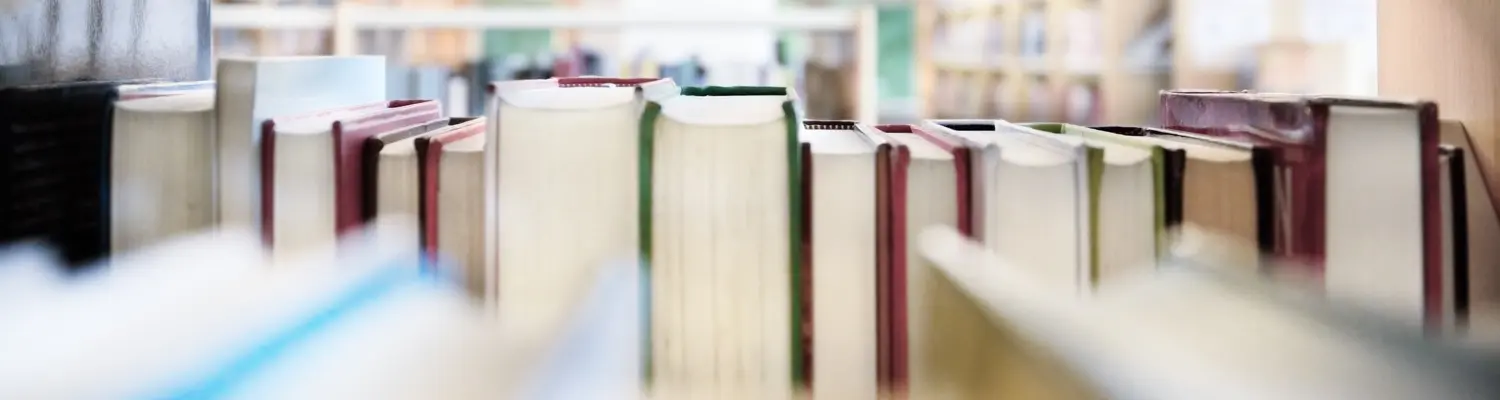 books on a shelf in a library