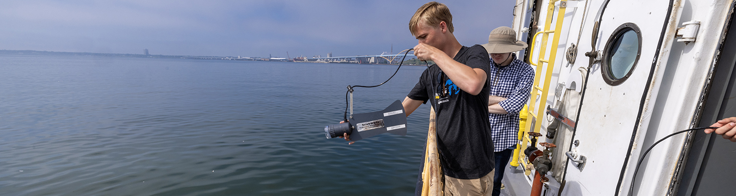 Two students launch equipment from Neeskay