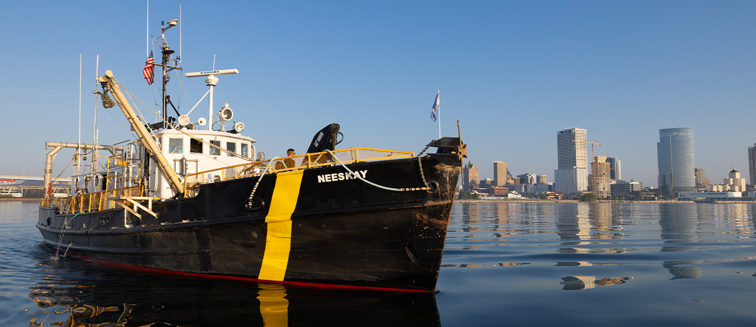 Neeskay and Milwaukee skyline