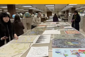 people looking at displays on tables