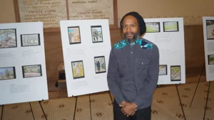 person in front of photos