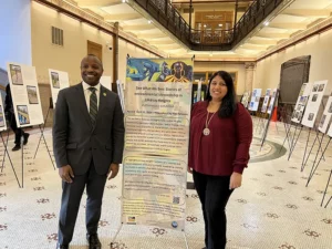 people in front of poster