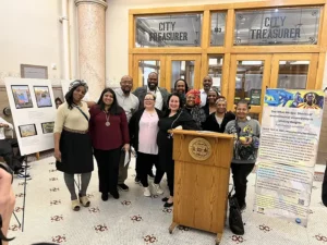 people posting at podium