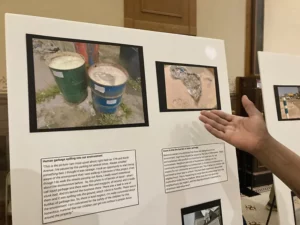 hand pointing to photos