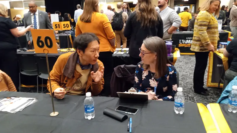 Dr. Woonsup Choi and Dr. Alison Donnely in the Graduate School Open House
