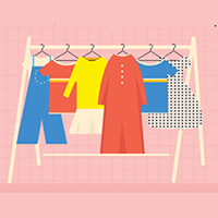 Image of children's clothing hanging on a rack