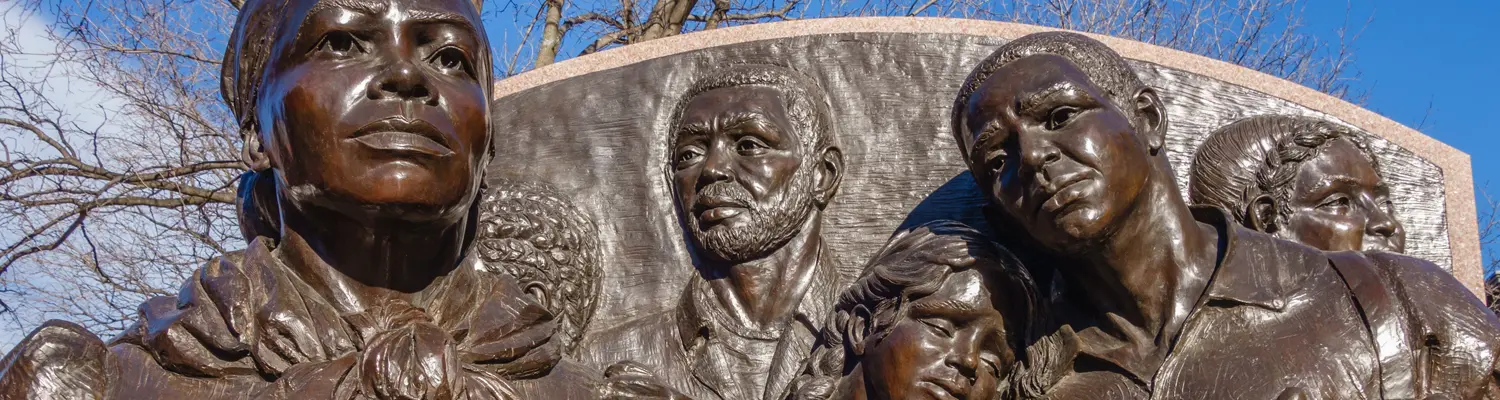 relief sculpture of Harriet Tubman and others