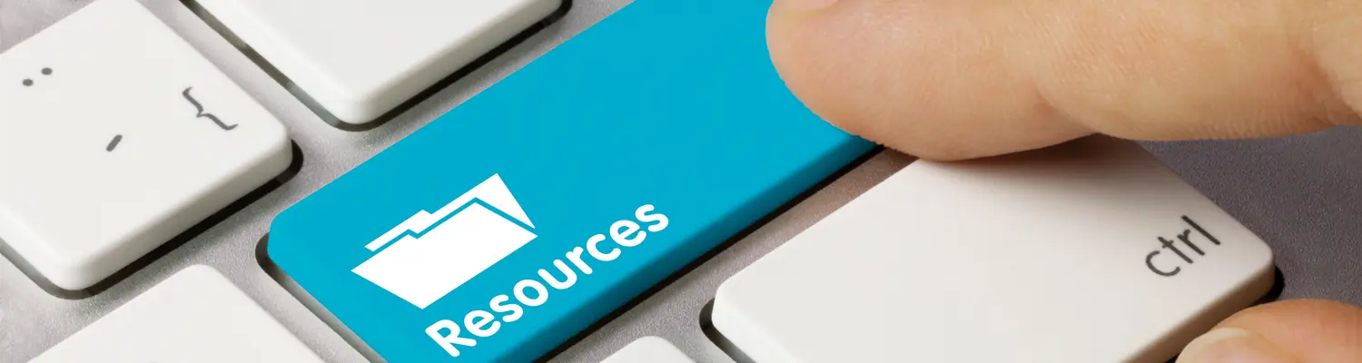 finger pressing keyboard key that reads "resources"