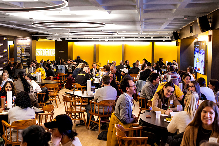 UWM employees playing trivia at the Gasthaus.