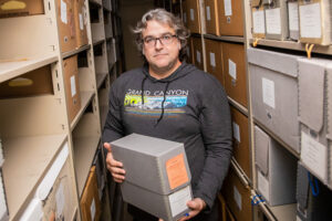 Recent SOIS Graduate, Brendan Dooley works in the UW-Milwaukee Archives.
