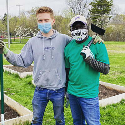 Two students at Community Garden Clean-up at Westlawn Gardents