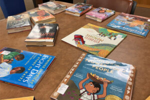 assorted books on table