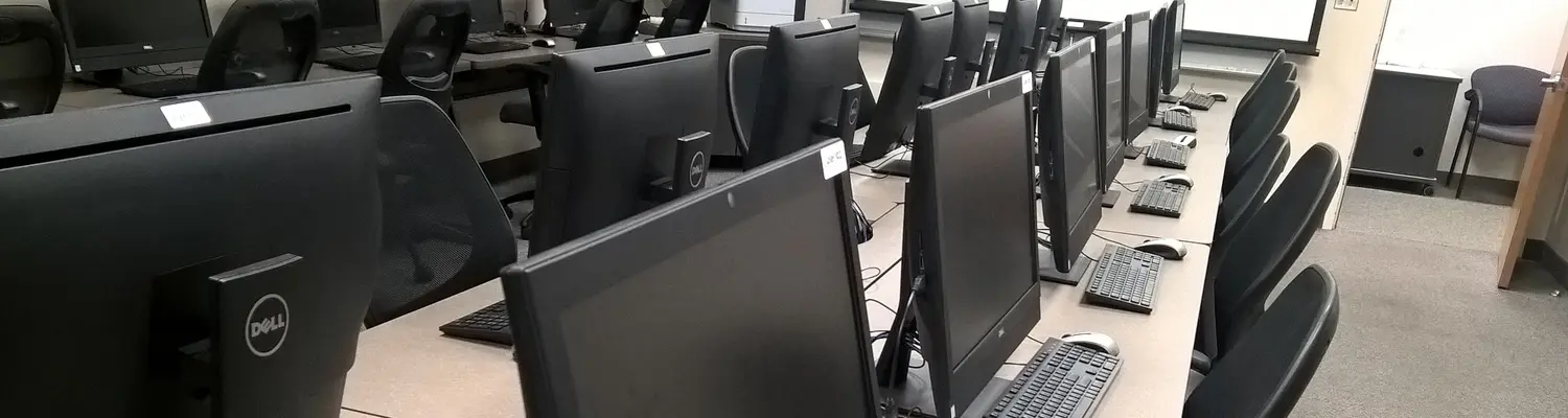 rows of computers in a learning lab