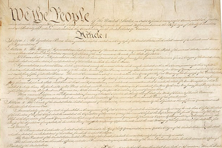 A weathered page of the US Constitution