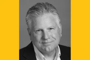 A headshot of an older white man