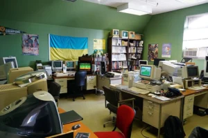 A room is full of old computers from decades past.